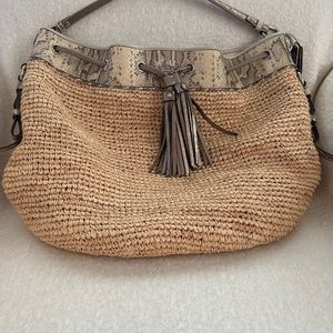 Coach vintage straw and leather trimmed tote!